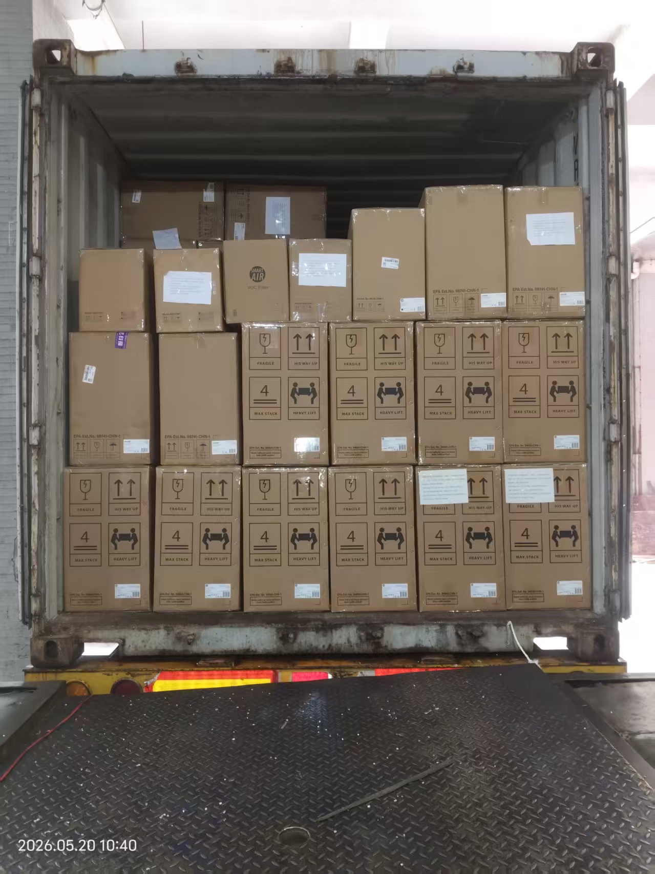 Container loading — boxed goods stacked and ready